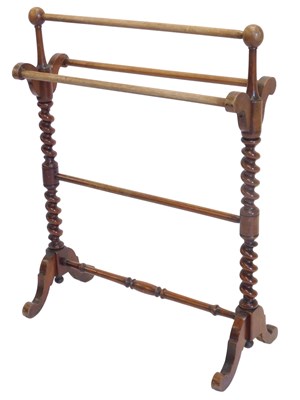 Lot 838 - A Victorian mahogany towel rail, on spirally...