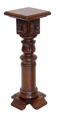 Lot 815 - A walnut torchere or plant stand, with turned...