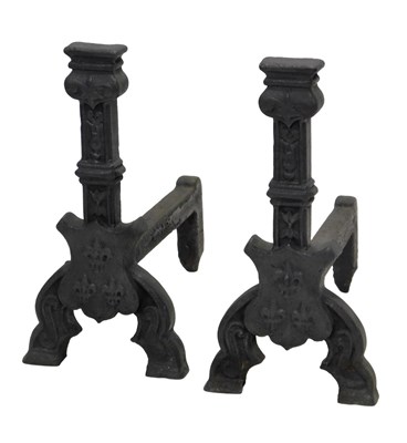 Lot 816 - A pair of cast iron fire dogs, each decorated...