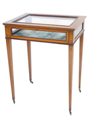 Lot 35 - An Edwardian mahogany marquetry and satinwood...