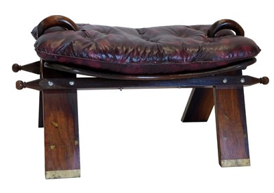 Lot 844 - An Eastern hardwood and brass inlaid camel...