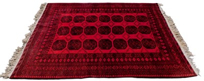 Lot 936 - A Turkish Bokhara red ground rug, with three...