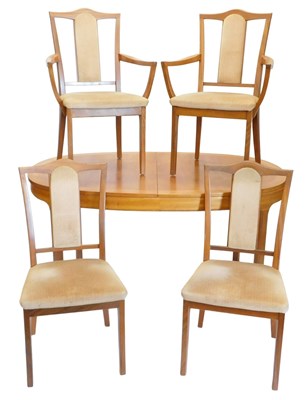 Lot 866 - A Nathan teak extending dining table, with a...