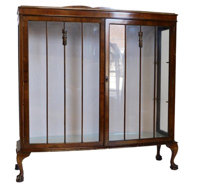 Lot 862 - An early 20thC walnut bowfronted display...