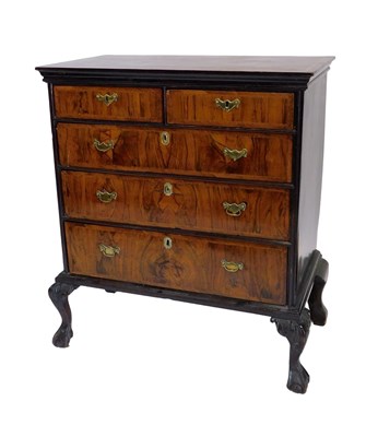 Lot 886 - A George I and later walnut and mahogany chest,...