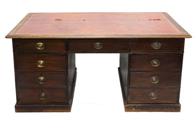 Lot 878 - An Edwardian mahogany twin pedestal desk, with...