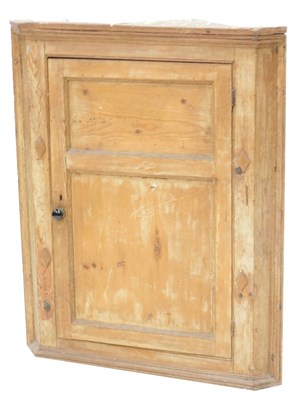 Lot 881 - A 19thC pine hanging corner cupboard, with a...