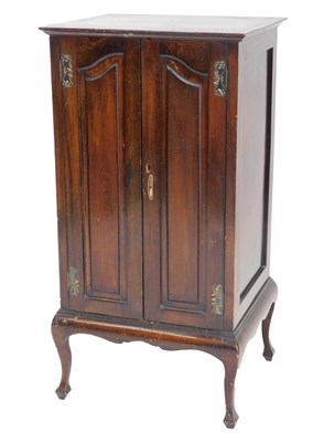 Lot 885 - A Victorian stained pine music cabinet, with a...