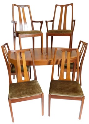 Lot 892 - A Nathan teak dining table and chairs,...