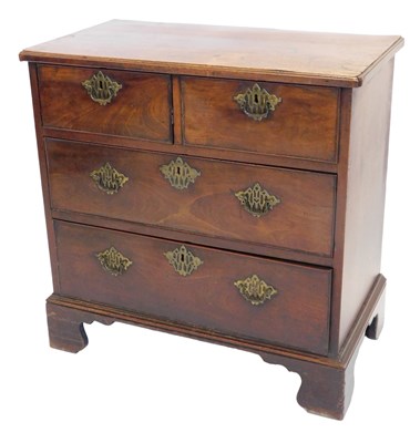 Lot 898 - A George III mahogany chest, two short over...