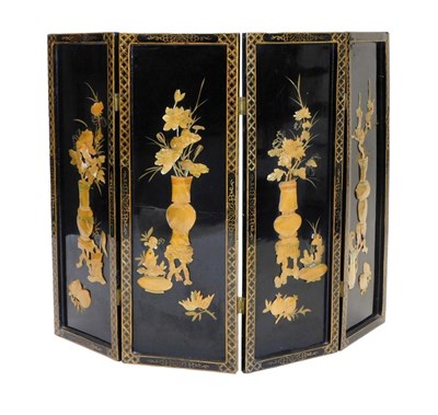 Lot 785 - A small Oriental lacquer screen, with applied...