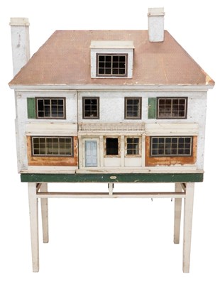 Lot 792 - A large Hamleys dolls house, modelled in the...