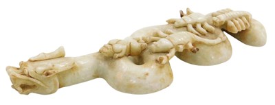 Lot 28 - A 20thC Chinese soapstone carving of a dragon,...