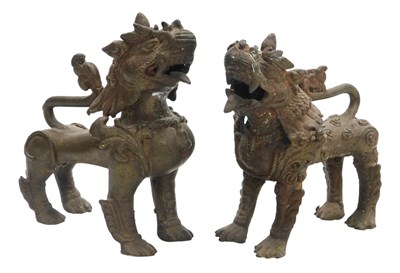 Lot 24 - Two 20thC Tibetan or Chinese bronze Foo...