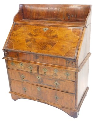 Lot 891 - An early/mid 18thC walnut and feather banded...