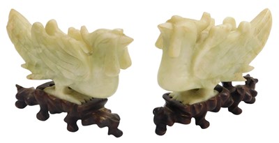 Lot 36 - A pair of 20thC Chinese soapstone carvings of...