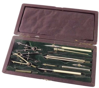 Lot 408 - A part set of drawing instruments, boxed.