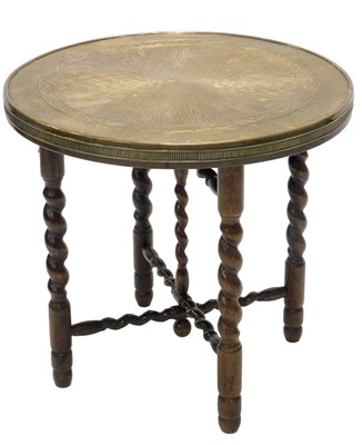 Lot 794 - An Indian brass tray table, with hammered...