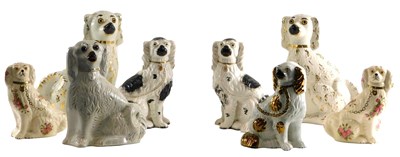 Lot 587 - A collection of Staffordshire spaniels, to...