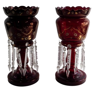 Lot 599 - A pair of Victorian ruby tinted and gilt table...