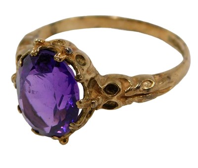 Lot 87 - A 9ct gold dress ring, set with an oval cut...