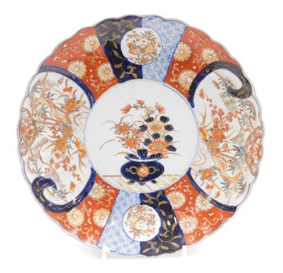 Lot 86 - A Japanese Meiji period Imari dish, of fluted...