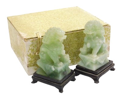 Lot 83 - A pair of 20thC Chinese jade Foo...