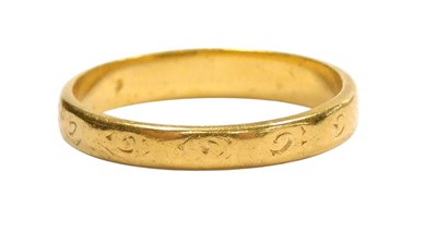 Lot 107 - A 22ct gold wedding band, with engraved...