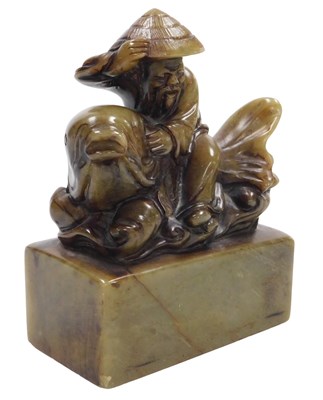Lot 123 - A 19thC Chinese carved soapstone figure of a...