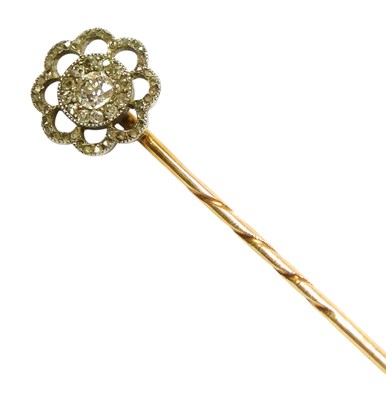 Lot 102 - An Edwardian diamond set tie pin, in an open...