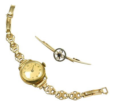 Lot 116 - A simulated pearl and blue stone brooch, in a...