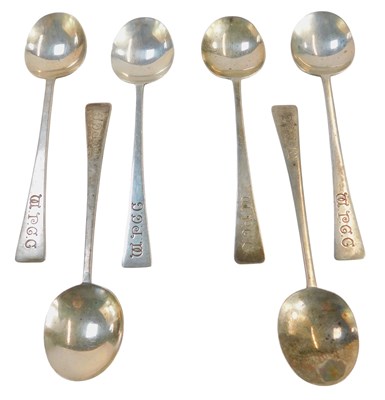 Lot 23 - A set of six George V silver spoons, each with...