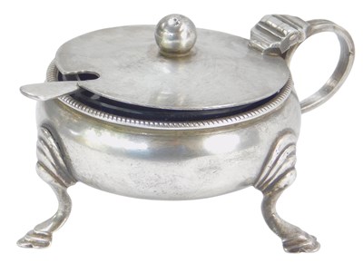 Lot 43 - A George III silver mustard pot, of bellied...