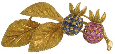 Lot 65 - An 18ct gold ruby and sapphire brooch, each...