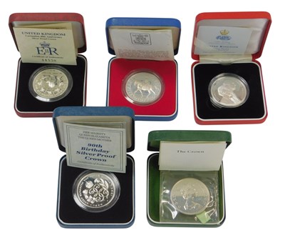 Lot 208 - Five Royal Mint silver proof crowns, for the...