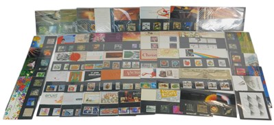 Lot 222 - Fifty Royal Mail stamp presentation packs, to...