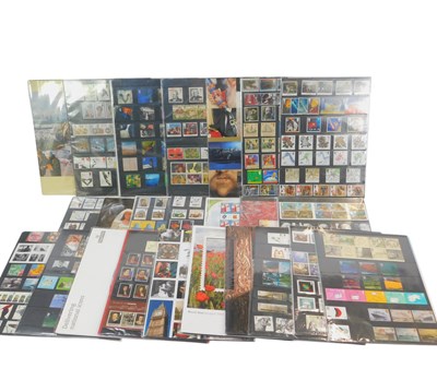 Lot 224 - Twenty four Royal Mail stamp presentation year...