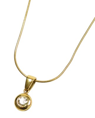 Lot 309 - An 18ct gold and diamond solitaire pendant, on...