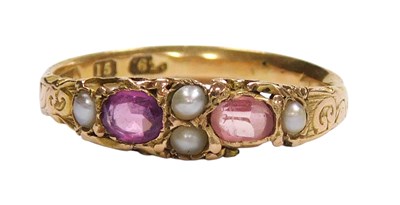 Lot 192 - A 15ct gold and pink two stone ring, set with...