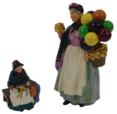 Lot 107 - A Royal Doulton figure modelled as Biddy Penny...