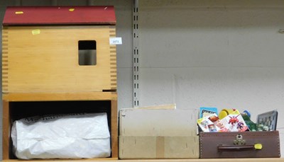 Lot 2072 - A wooden two storey doll's house, with a red...