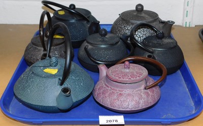 Lot 2078 - Seven Oriental style cast iron teapots.