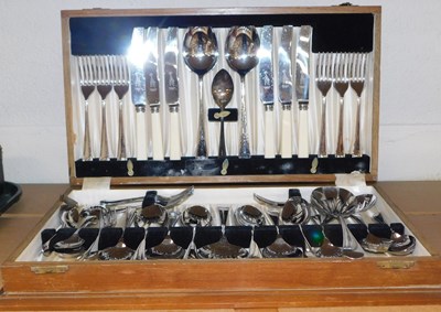 Lot 2086 - An oak cased canteen of cutlery.