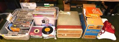 Lot 2175 - A tabletop record player, together with...