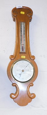 Lot 2192 - An oak cased wall barometer, the circular dial...