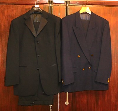 Lot 2194 - A Moss Bros black dinner jacket and trousers,...
