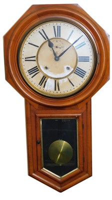 Lot 157 - A late 19thC Ansonia Clock Co light mahogany...