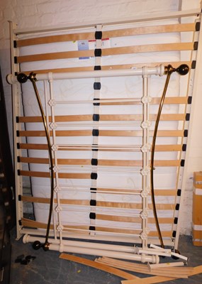 Lot 1004 - A Victorian style double bed frame, in cream,...