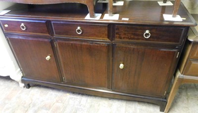 Lot 1006 - A Stag Minstrel sideboard, with three drawers...