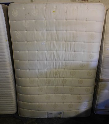 Lot 1013 - A double mattress, with bed base.